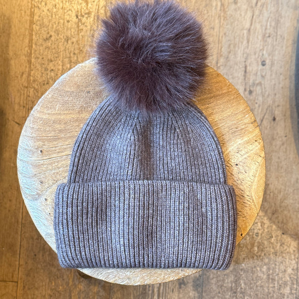 Italian knit pom caps