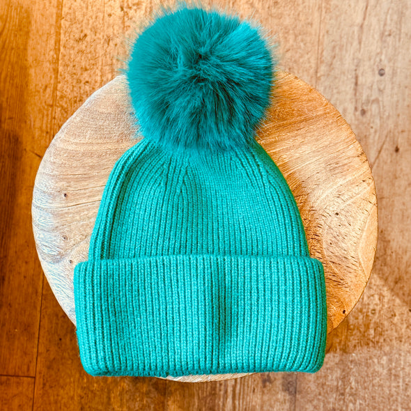 Italian knit pom caps