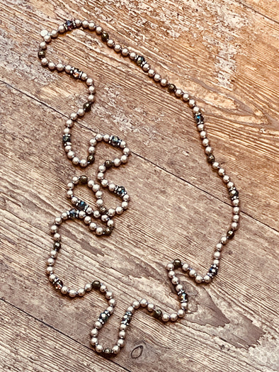 Long station pearl necklace
