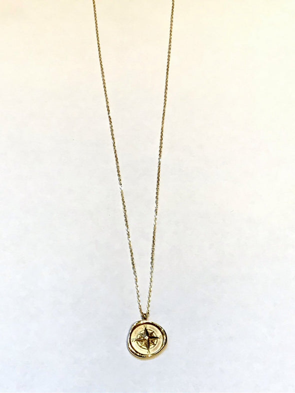 Gold compass necklace